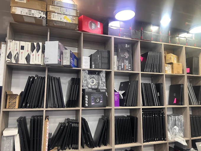 Laptops and boxed equipment on display at Affordable Laptops in Crown Mines, Johannesburg